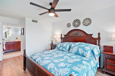 This beautifully updated 2-bedroom plus den residence in the on Isla Del Sol Yacht and Country Club in Florida - for sale on GolfHomes.com, golf home, golf lot