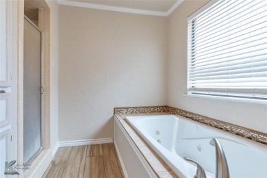 This spacious, family home in the sought after Fairway Oaks on Abilene Country Club - South Course in Texas - for sale on GolfHomes.com, golf home, golf lot