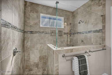 Exceptional curb appeal defines this beautifully designed on Cape Fear National At Brunswick Forest in North Carolina - for sale on GolfHomes.com, golf home, golf lot