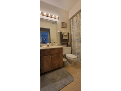 Beautiful end unit condo, located on tranquil pond with serene on Tarpon Woods Golf Club in Florida - for sale on GolfHomes.com, golf home, golf lot
