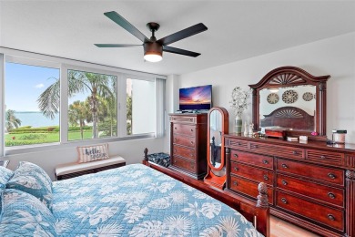 This beautifully updated 2-bedroom plus den residence in the on Isla Del Sol Yacht and Country Club in Florida - for sale on GolfHomes.com, golf home, golf lot