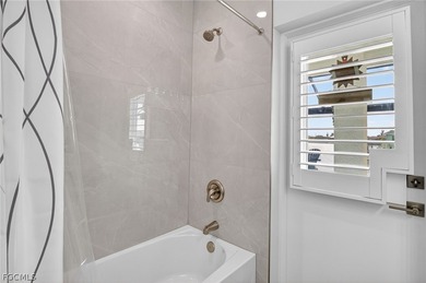 Lakefront Custom Pool Home (built 2023), offering the perfect on Del Tura Golf and Country Club in Florida - for sale on GolfHomes.com, golf home, golf lot