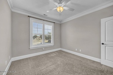 Exceptional curb appeal defines this beautifully designed on Cape Fear National At Brunswick Forest in North Carolina - for sale on GolfHomes.com, golf home, golf lot