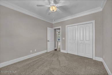 Exceptional curb appeal defines this beautifully designed on Cape Fear National At Brunswick Forest in North Carolina - for sale on GolfHomes.com, golf home, golf lot