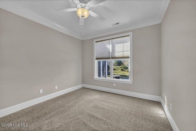 Exceptional curb appeal defines this beautifully designed on Cape Fear National At Brunswick Forest in North Carolina - for sale on GolfHomes.com, golf home, golf lot