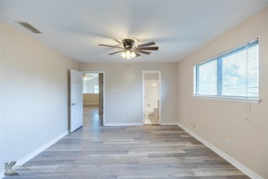 This spacious, family home in the sought after Fairway Oaks on Abilene Country Club - South Course in Texas - for sale on GolfHomes.com, golf home, golf lot