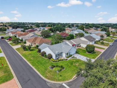 Impeccably manicured home set on a corner lot the The Villages on Nancy Lopez Legacy Golf and Country Club in Florida - for sale on GolfHomes.com, golf home, golf lot