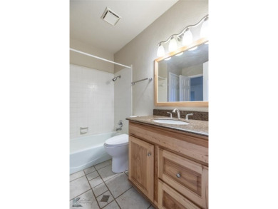 This spacious, family home in the sought after Fairway Oaks on Abilene Country Club - South Course in Texas - for sale on GolfHomes.com, golf home, golf lot