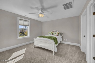 Exceptional curb appeal defines this beautifully designed on Cape Fear National At Brunswick Forest in North Carolina - for sale on GolfHomes.com, golf home, golf lot