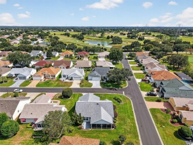 Impeccably manicured home set on a corner lot the The Villages on Nancy Lopez Legacy Golf and Country Club in Florida - for sale on GolfHomes.com, golf home, golf lot