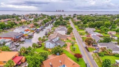 Welcome to this AMAZING Santa Rosa Shores Canal home in Gulf on Tiger Point Golf and Country Club in Florida - for sale on GolfHomes.com, golf home, golf lot