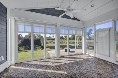 Exceptional curb appeal defines this beautifully designed on Cape Fear National At Brunswick Forest in North Carolina - for sale on GolfHomes.com, golf home, golf lot