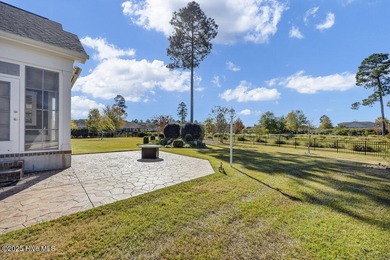 Exceptional curb appeal defines this beautifully designed on Cape Fear National At Brunswick Forest in North Carolina - for sale on GolfHomes.com, golf home, golf lot