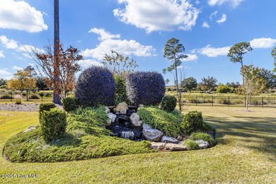 Exceptional curb appeal defines this beautifully designed on Cape Fear National At Brunswick Forest in North Carolina - for sale on GolfHomes.com, golf home, golf lot