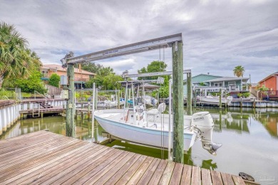 Welcome to this AMAZING Santa Rosa Shores Canal home in Gulf on Tiger Point Golf and Country Club in Florida - for sale on GolfHomes.com, golf home, golf lot