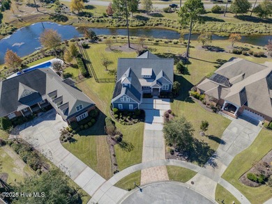 Exceptional curb appeal defines this beautifully designed on Cape Fear National At Brunswick Forest in North Carolina - for sale on GolfHomes.com, golf home, golf lot