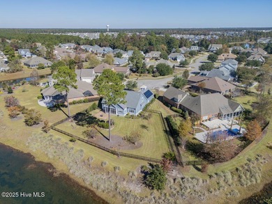 Exceptional curb appeal defines this beautifully designed on Cape Fear National At Brunswick Forest in North Carolina - for sale on GolfHomes.com, golf home, golf lot