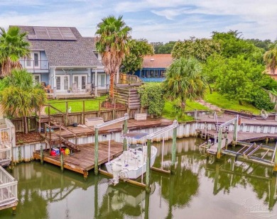 Welcome to this AMAZING Santa Rosa Shores Canal home in Gulf on Tiger Point Golf and Country Club in Florida - for sale on GolfHomes.com, golf home, golf lot