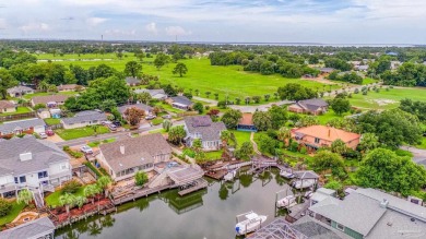 Welcome to this AMAZING Santa Rosa Shores Canal home in Gulf on Tiger Point Golf and Country Club in Florida - for sale on GolfHomes.com, golf home, golf lot