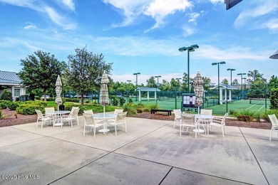Exceptional curb appeal defines this beautifully designed on Cape Fear National At Brunswick Forest in North Carolina - for sale on GolfHomes.com, golf home, golf lot