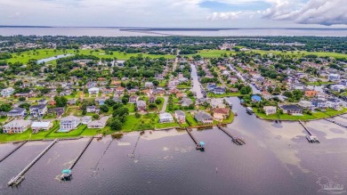 Welcome to this AMAZING Santa Rosa Shores Canal home in Gulf on Tiger Point Golf and Country Club in Florida - for sale on GolfHomes.com, golf home, golf lot