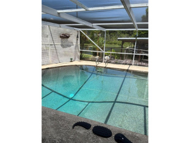 Nestled in the sought after 55+ community of Imperial Terrace on Bay Tree Golf Course in Florida - for sale on GolfHomes.com, golf home, golf lot