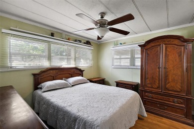 Nestled in the sought after 55+ community of Imperial Terrace on Bay Tree Golf Course in Florida - for sale on GolfHomes.com, golf home, golf lot