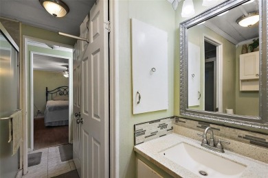 Nestled in the sought after 55+ community of Imperial Terrace on Bay Tree Golf Course in Florida - for sale on GolfHomes.com, golf home, golf lot