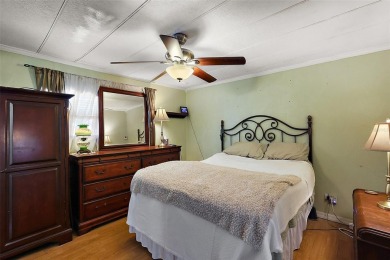 Nestled in the sought after 55+ community of Imperial Terrace on Bay Tree Golf Course in Florida - for sale on GolfHomes.com, golf home, golf lot