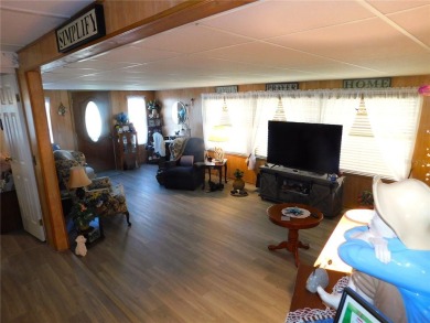 As you step into this well-maintained home, you're immediately on Betmar Acres Golf Club in Florida - for sale on GolfHomes.com, golf home, golf lot