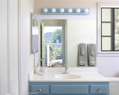 Welcome to Evergreen! Tucked high among the trees with panoramic on Lake Arrowhead Country Club in California - for sale on GolfHomes.com, golf home, golf lot