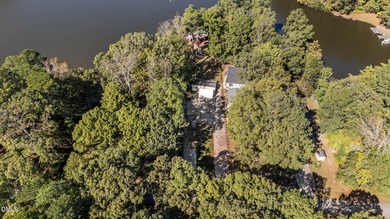 THE ULTIMATE LAKESIDE PLAYGROUND IS WAITING FOR YOU AT LAKE on River Golf and Country Club at Lake Royale in North Carolina - for sale on GolfHomes.com, golf home, golf lot