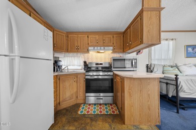 HUGE PRICE DROP!! SELLER FINANCING AVAILABLE!! THE ULTIMATE on River Golf and Country Club at Lake Royale in North Carolina - for sale on GolfHomes.com, golf home, golf lot