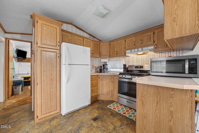 HUGE PRICE DROP!! SELLER FINANCING AVAILABLE!! THE ULTIMATE on River Golf and Country Club at Lake Royale in North Carolina - for sale on GolfHomes.com, golf home, golf lot