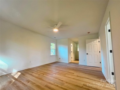 Welcome Home! This beautifully renovated property sits on a rare on  in North Carolina - for sale on GolfHomes.com, golf home, golf lot