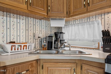 HUGE PRICE DROP!! SELLER FINANCING AVAILABLE!! THE ULTIMATE on River Golf and Country Club at Lake Royale in North Carolina - for sale on GolfHomes.com, golf home, golf lot