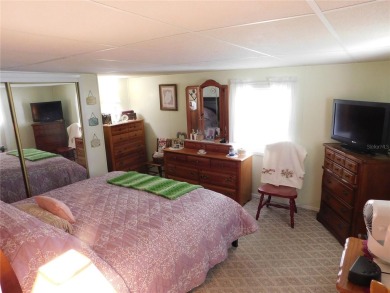 As you step into this well-maintained home, you're immediately on Betmar Acres Golf Club in Florida - for sale on GolfHomes.com, golf home, golf lot