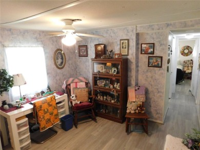 As you step into this well-maintained home, you're immediately on Betmar Acres Golf Club in Florida - for sale on GolfHomes.com, golf home, golf lot