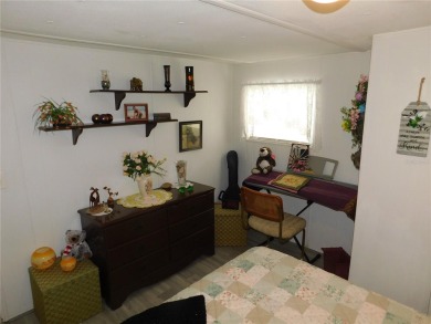 As you step into this well-maintained home, you're immediately on Betmar Acres Golf Club in Florida - for sale on GolfHomes.com, golf home, golf lot