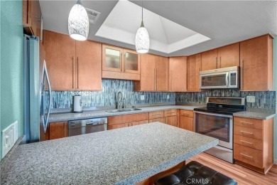 Charming corner end unit in private and peaceful Mutual 3 at on Leisure World Seal Beach Golf Course in California - for sale on GolfHomes.com, golf home, golf lot