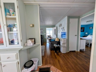 Turnkey Living! Expanded 2BR/2BA in Woodbrook Estates!  This on Grasslands Golf and Country Club in Florida - for sale on GolfHomes.com, golf home, golf lot