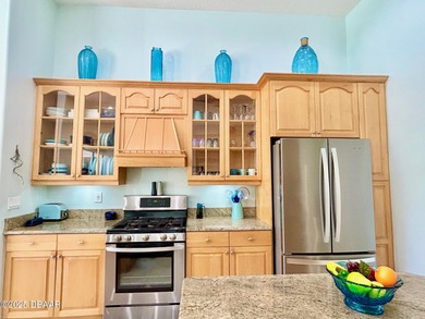 FRESH OUT OF 'HOUSE BEAUTIFUL' AND 'FINE GARDENING'!!! This on Halifax Plantation Golf Club in Florida - for sale on GolfHomes.com, golf home, golf lot