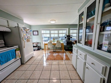 Turnkey Living! Expanded 2BR/2BA in Woodbrook Estates!  This on Grasslands Golf and Country Club in Florida - for sale on GolfHomes.com, golf home, golf lot