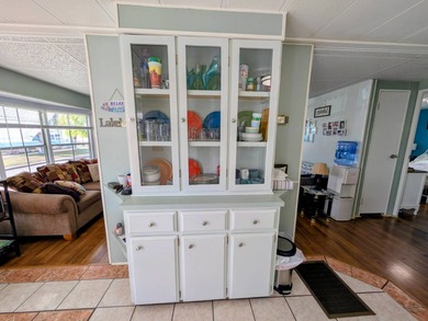 Turnkey Living! Expanded 2BR/2BA in Woodbrook Estates!  This on Grasslands Golf and Country Club in Florida - for sale on GolfHomes.com, golf home, golf lot