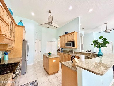 FRESH OUT OF 'HOUSE BEAUTIFUL' AND 'FINE GARDENING'!!! This on Halifax Plantation Golf Club in Florida - for sale on GolfHomes.com, golf home, golf lot