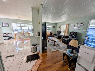 Turnkey Living! Expanded 2BR/2BA in Woodbrook Estates!  This on Grasslands Golf and Country Club in Florida - for sale on GolfHomes.com, golf home, golf lot