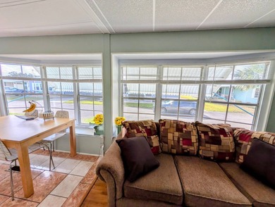 Turnkey Living! Expanded 2BR/2BA in Woodbrook Estates!  This on Grasslands Golf and Country Club in Florida - for sale on GolfHomes.com, golf home, golf lot