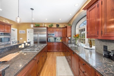 Experience elevated living in this executive estate nestled at on Stone Water Country Club in Michigan - for sale on GolfHomes.com, golf home, golf lot