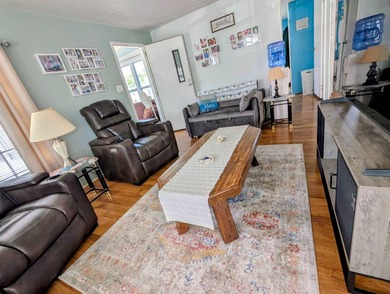 Turnkey Living! Expanded 2BR/2BA in Woodbrook Estates!  This on Grasslands Golf and Country Club in Florida - for sale on GolfHomes.com, golf home, golf lot