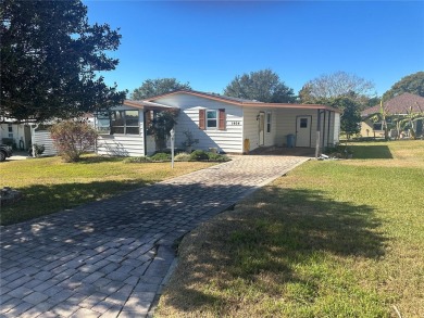 Double wide mobile home with 2 bedrooms, 2 Baths and 1040 sq ft on Orange Blossom Hills Golf and Country Club in Florida - for sale on GolfHomes.com, golf home, golf lot